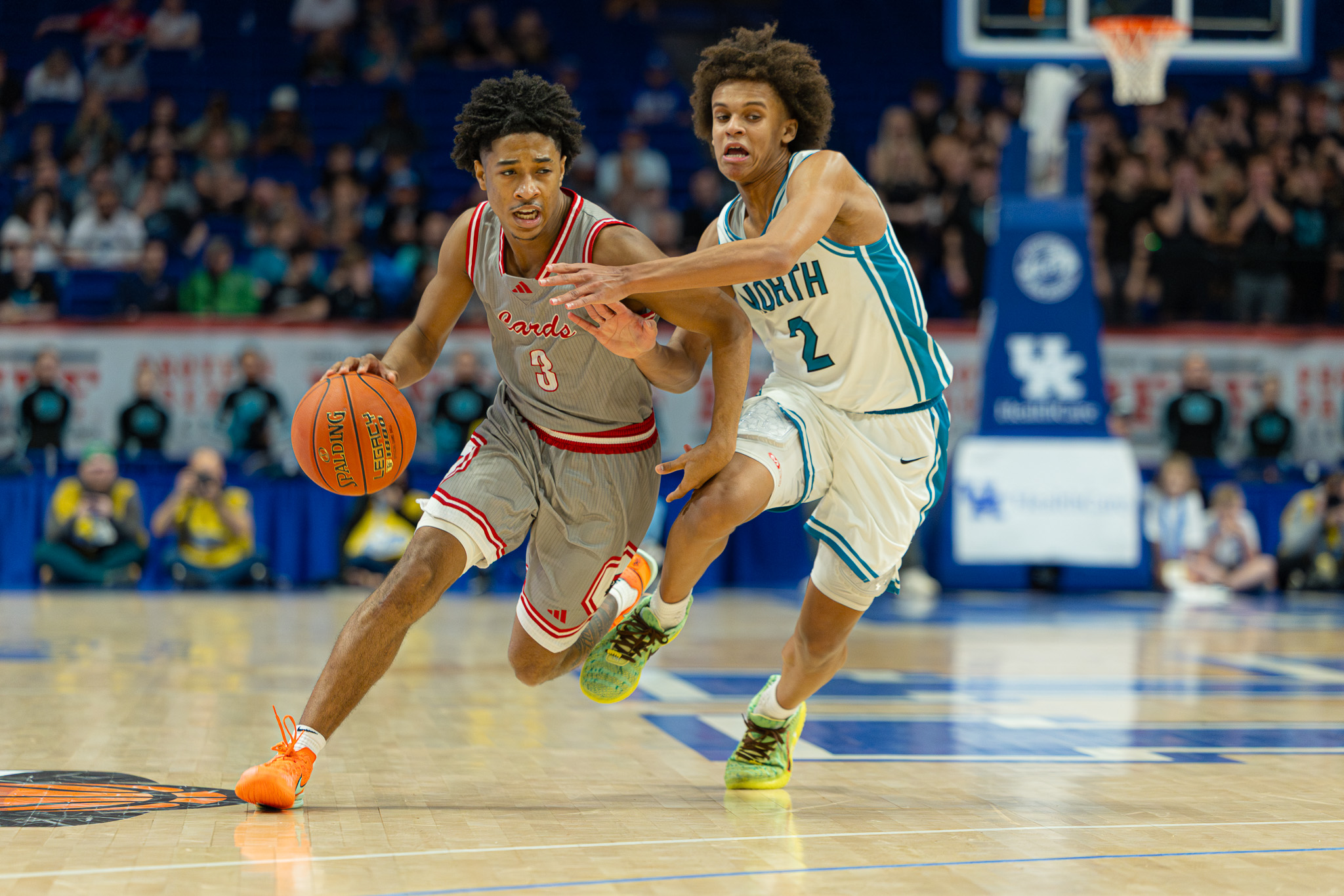 Malachi Ashford of George Rogers Clark is guarded by Pierre Rondo of North Oldham in the semifinals of the Sweet 16® at Rupp Arena on March 21, 2026.