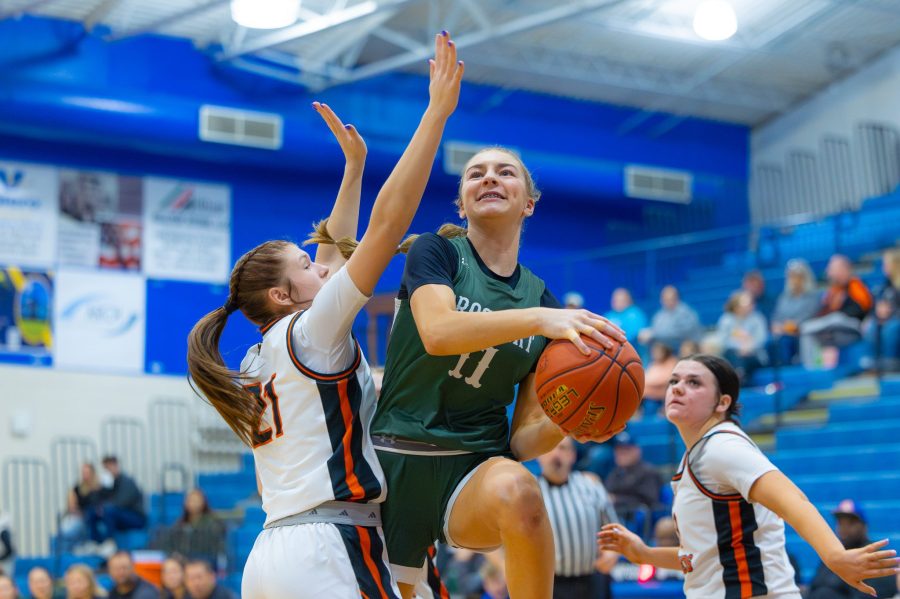 Kylie Smith of Bishop Brossart goes up for a layup against an Augusta defender in the first round of the All “A” Classic in Brooksville on Jan 10, 2026.