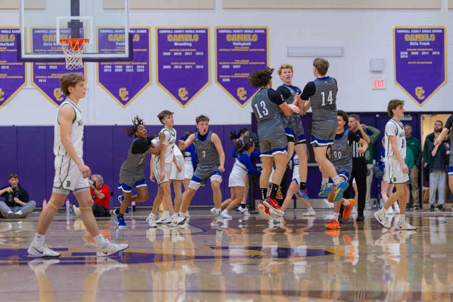 Jordan Clemons celebrates with his Scott teammates after making the game-winning shot against Bishop Brossart in the 37th District semifinal on February 24, 2026 at Campbell County Middle School.
