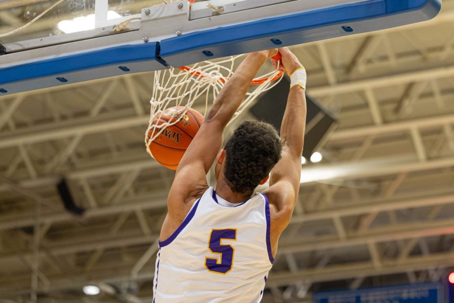 Austin Davie of Campbell County throws down a dunk against Nicholas County in the quarterfinals of the 10th Region Tournament vs. Nicholas County at the Fieldhouse on March 4, 2026.